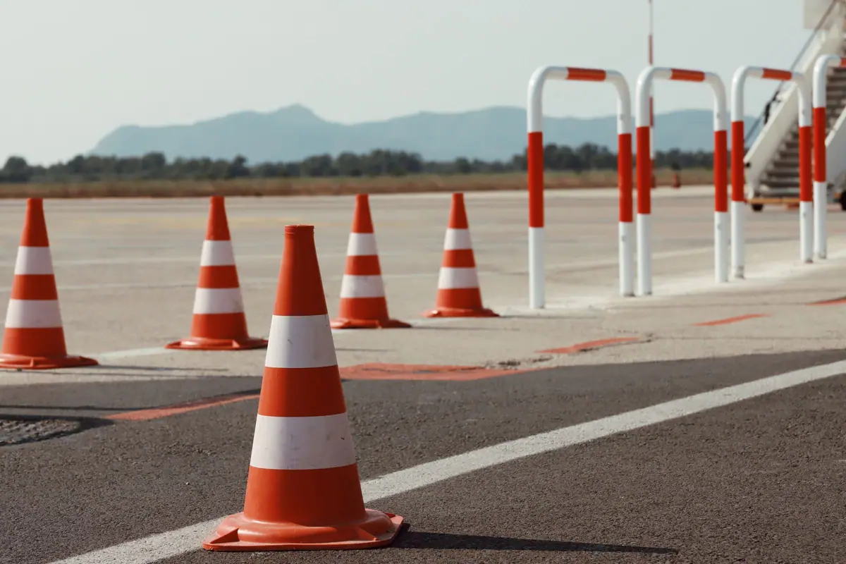 Traffic cones on an empty paved lot