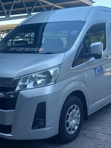 The minibus. Transport included on every full day.